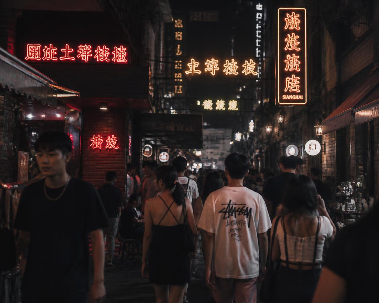 Neon-lit Shanghai nightlife alley at night